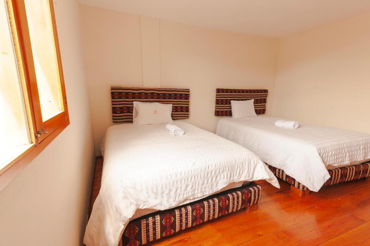 Los Ponchos Inn Apartasuite オタバロ エクステリア 写真