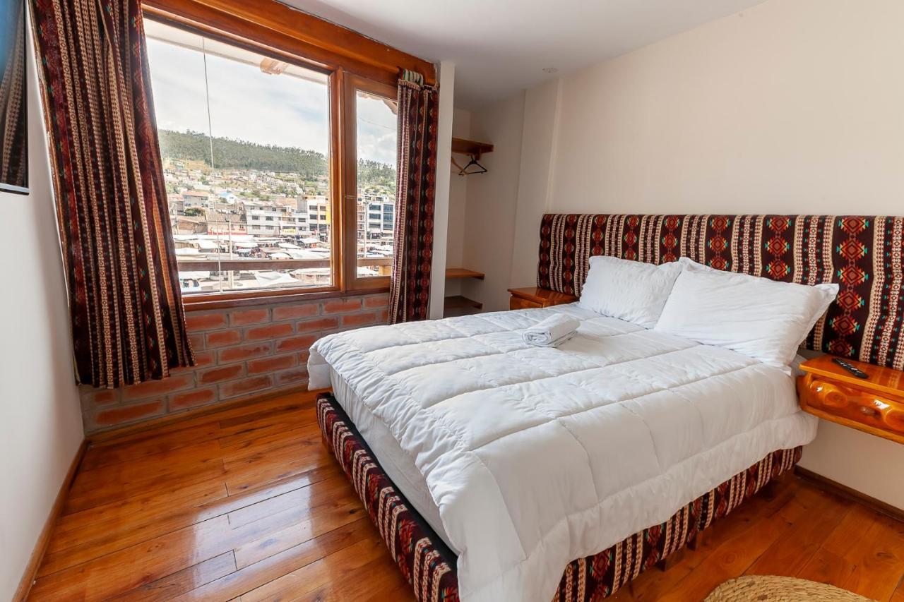 Los Ponchos Inn Apartasuite オタバロ エクステリア 写真